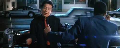 Gif of Jackie Chan & Chris Tucker dancing in "Rush Hour"